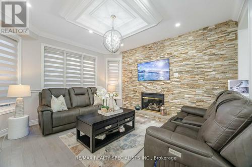 37 Harbourtown Crescent, Brampton, ON - Indoor Photo Showing Living Room With Fireplace