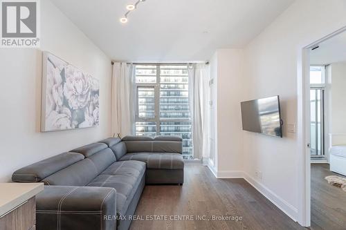 2406 - 33 Shore Breeze Drive, Toronto, ON - Indoor Photo Showing Living Room