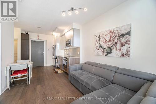 2406 - 33 Shore Breeze Drive, Toronto, ON - Indoor Photo Showing Living Room