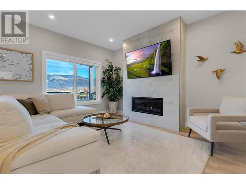 6811 Nighthawk Drive Unit# 2, Osoyoos, BC - Indoor Photo Showing Living Room With Fireplace