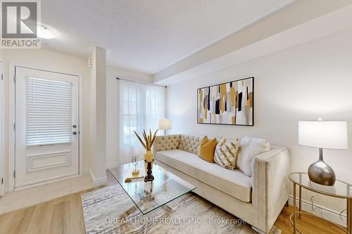 13 - 40 Mendelssohn Street W, Toronto, ON - Indoor Photo Showing Living Room