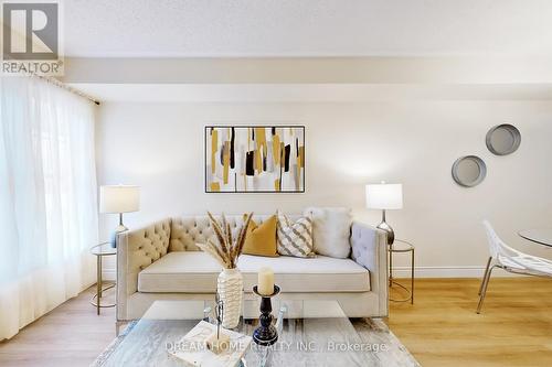 13 - 40 Mendelssohn Street W, Toronto, ON - Indoor Photo Showing Living Room