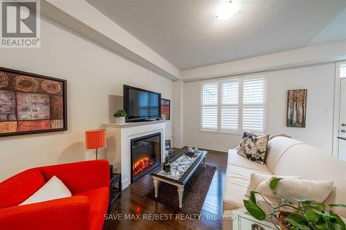 35 Conarty Crescent, Whitby, ON - Indoor Photo Showing Living Room With Fireplace