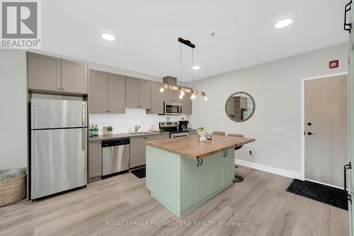 203 - 43 Dale Drive, New Tecumseth, ON - Indoor Photo Showing Kitchen With Stainless Steel Kitchen