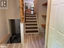 Staircase featuring wood-type flooring and ceiling fan - 1010 Fern Glen Road, Emsdale, ON  - Indoor Photo Showing Other Room 