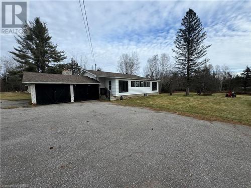 View of front facade with a front yard - 3877 Hwy 17 E, Mattawa, ON - Outdoor