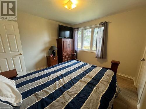 Bedroom featuring hardwood / wood-style floors - 3877 Hwy 17 E, Mattawa, ON - Indoor Photo Showing Bedroom