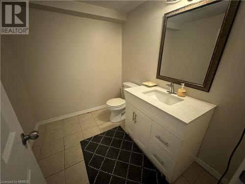 Bathroom featuring tile patterned floors, vanity, and toilet - 3877 Hwy 17 E, Mattawa, ON - Indoor Photo Showing Bathroom