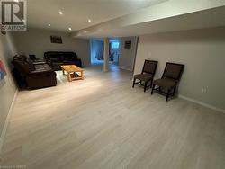 Living area featuring light hardwood / wood-style flooring - 