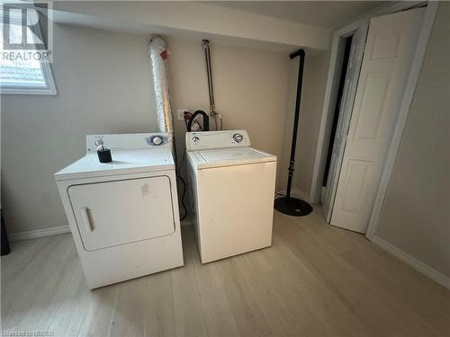 Laundry area featuring independent washer and dryer and light wood-type flooring - 3877 Hwy 17 E, Mattawa, ON - Indoor Photo Showing Laundry Room