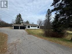 View of front of home featuring a front lawn - 