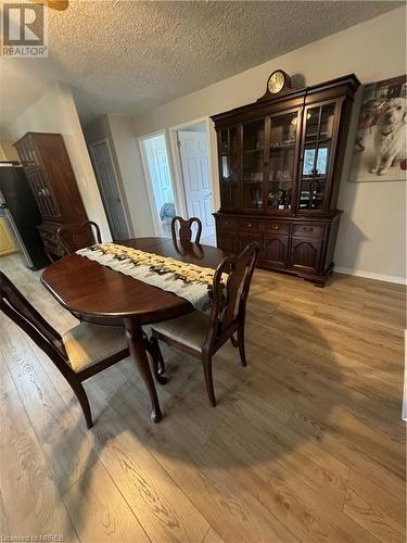 Dining room featuring light hardwood / wood-style floors and a textured ceiling - 3877 Hwy 17 E, Mattawa, ON - Indoor