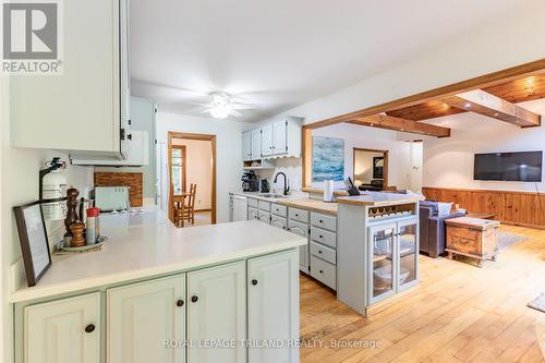 Kitchen w/ Corian counters - 10342 Beach O' Pines Road, Lambton Shores (Grand Bend), ON - Indoor Photo Showing Kitchen