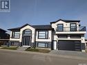 135 Fast Crescent, Saskatoon, SK  - Outdoor With Balcony With Facade 