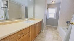 Bathroom with shower / tub combo and vanity - 