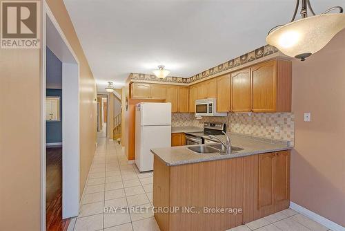 25 Muirland Crescent, Brampton, ON - Indoor Photo Showing Kitchen With Double Sink