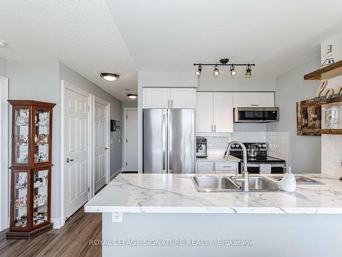 1019A-700 Humberwood Blvd, Toronto, ON - Indoor Photo Showing Kitchen With Double Sink With Upgraded Kitchen