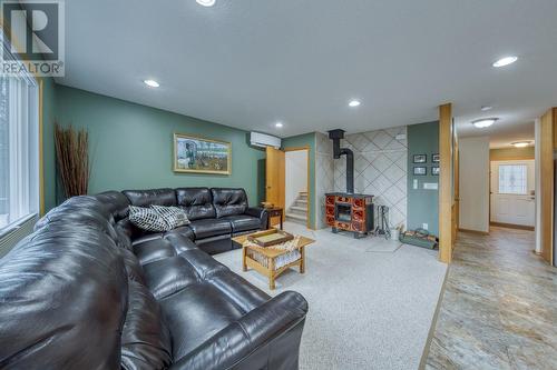 Living area - stairs to upper floor in the back left corner - 4880 James Street, Fairmont Hot Springs, BC - Indoor