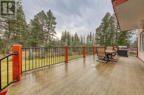 Large deck, accessed from living/dining area - 4880 James Street, Fairmont Hot Springs, BC - Outdoor With Deck Patio Veranda With Exterior