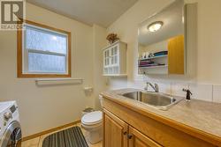 Half-bathroom and laundry room combined - 