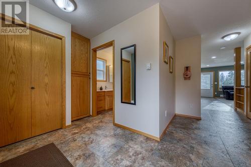 View of interior from front door - full sized bathroom 1 - 4880 James Street, Fairmont Hot Springs, BC - Indoor Photo Showing Other Room