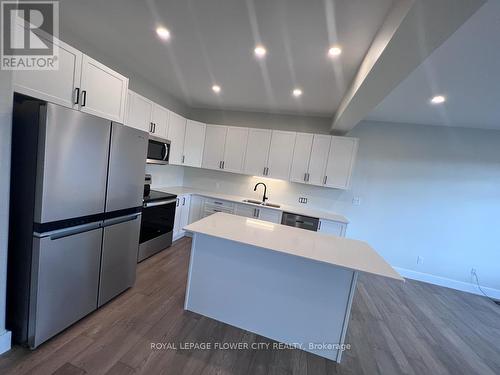 36 Dusenbury Drive, Loyalist, ON - Indoor Photo Showing Kitchen With Double Sink