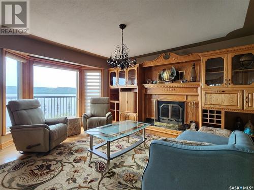 424 Abel Drive, Crooked Lake, SK - Indoor Photo Showing Living Room With Fireplace