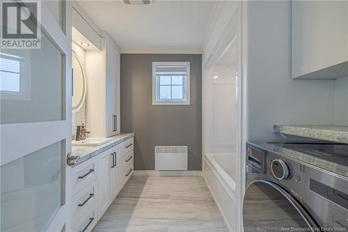 653 Rue Principale, Beresford, NB - Indoor Photo Showing Laundry Room