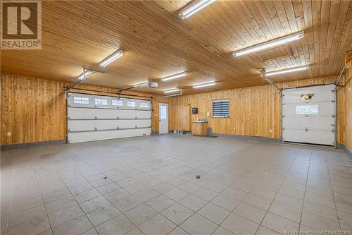 653 Rue Principale, Beresford, NB - Indoor Photo Showing Garage