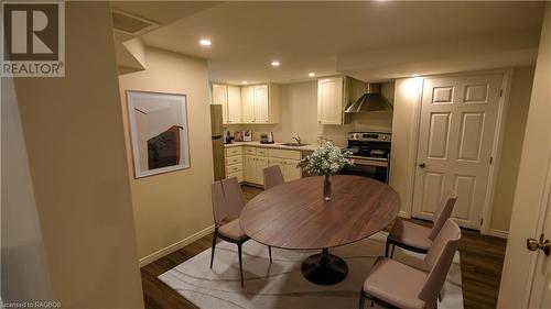 Dining and Kitchen Space - Virtually Staged - 228 Byeland Drive, Mount Forest, ON - Indoor Photo Showing Dining Room