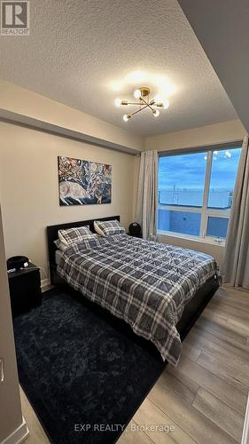 Bedroom - 322 - 5055 Greenlane Road, Lincoln (981 - Lincoln Lake), ON - Indoor Photo Showing Bedroom