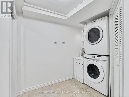 64 - 1075 Ellesmere Road, Toronto, ON - Indoor Photo Showing Laundry Room