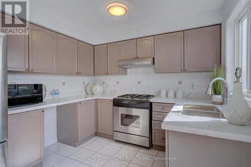 145 Raponi Circle, Toronto, ON - Indoor Photo Showing Kitchen With Double Sink