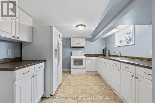 7803 Beaverdams Road, Niagara Falls (213 - Ascot), ON - Indoor Photo Showing Kitchen With Double Sink