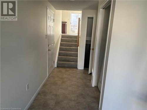 Hall featuring a textured ceiling - 29 Madeleine Street, Kitchener, ON - Indoor Photo Showing Other Room