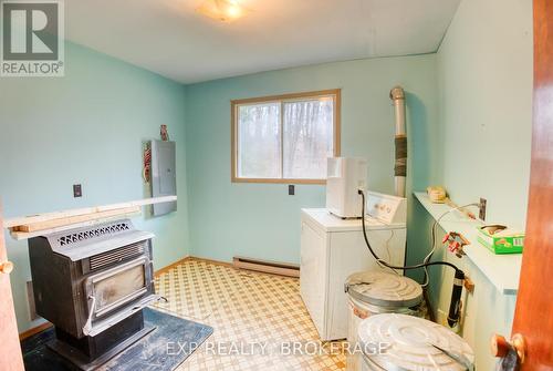 28114C Hwy 7, Central Frontenac (Frontenac Centre), ON - Indoor Photo Showing Other Room With Fireplace