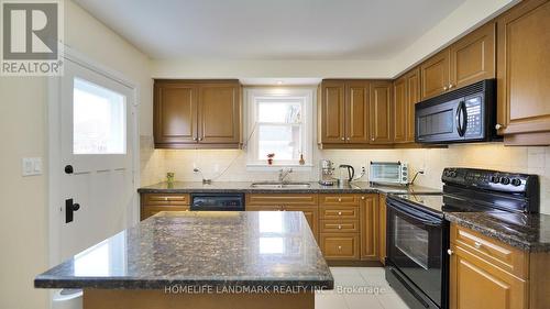 33 Artisan Trail, Markham, ON - Indoor Photo Showing Kitchen With Double Sink