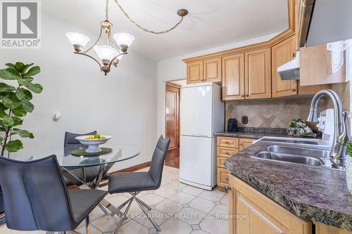 97 Strathearne Avenue, Hamilton, ON - Indoor Photo Showing Kitchen With Double Sink