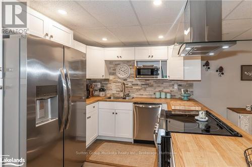 28 Tall Pine Road, Huntsville (Stephenson), ON - Indoor Photo Showing Kitchen With Double Sink