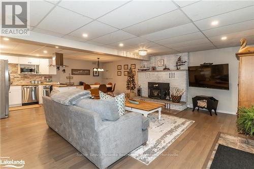 28 Tall Pine Road, Huntsville (Stephenson), ON - Indoor Photo Showing Living Room With Fireplace