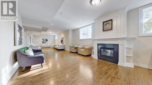 2B Carluke Crescent, Toronto, ON - Indoor Photo Showing Living Room With Fireplace