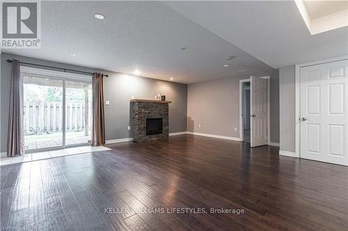 2 - 95 Capulet Lane, London, ON - Indoor Photo Showing Living Room With Fireplace