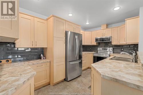 325 Village Grove Unit# 403, St. Clair Beach, ON - Indoor Photo Showing Kitchen With Double Sink