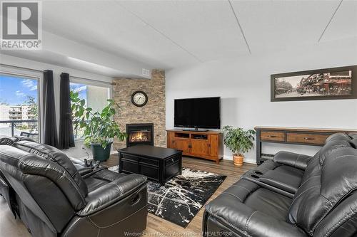 325 Village Grove Unit# 403, St. Clair Beach, ON - Indoor Photo Showing Living Room With Fireplace