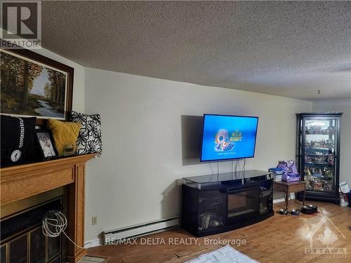 43 - 92 Haxby, Ottawa, ON - Indoor Photo Showing Living Room With Fireplace