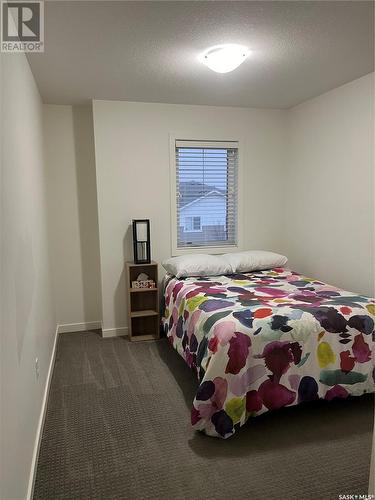 1 4545 Delhaye Way, Regina, SK - Indoor Photo Showing Bedroom