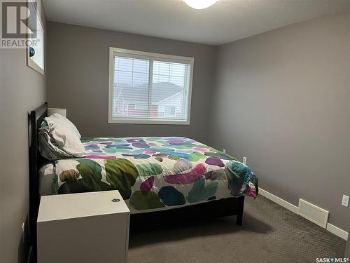 1 4545 Delhaye Way, Regina, SK - Indoor Photo Showing Bedroom