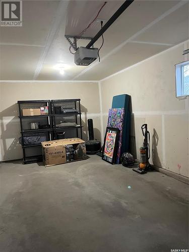 1 4545 Delhaye Way, Regina, SK - Indoor Photo Showing Garage