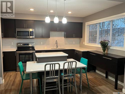 1 4545 Delhaye Way, Regina, SK - Indoor Photo Showing Kitchen With Stainless Steel Kitchen With Upgraded Kitchen