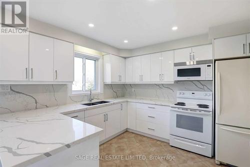 94 Rockford Road, Toronto, ON - Indoor Photo Showing Kitchen With Double Sink